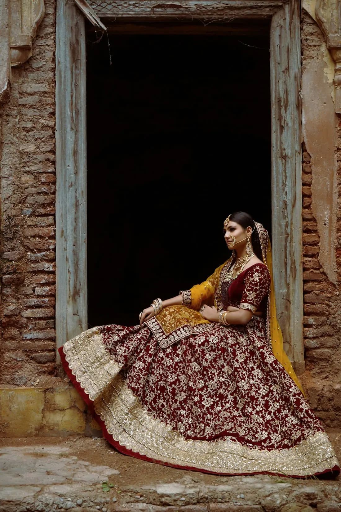 Marasim Zardozi Lehenga in maroon